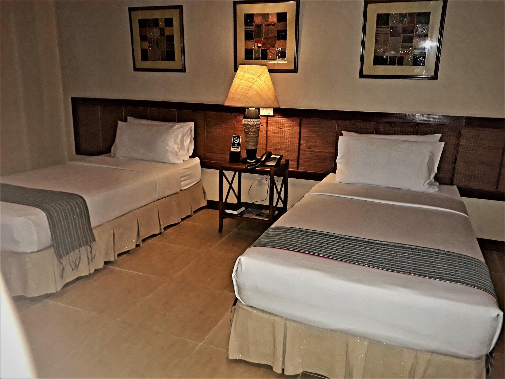Java Hotel Laoag Luaran gambar