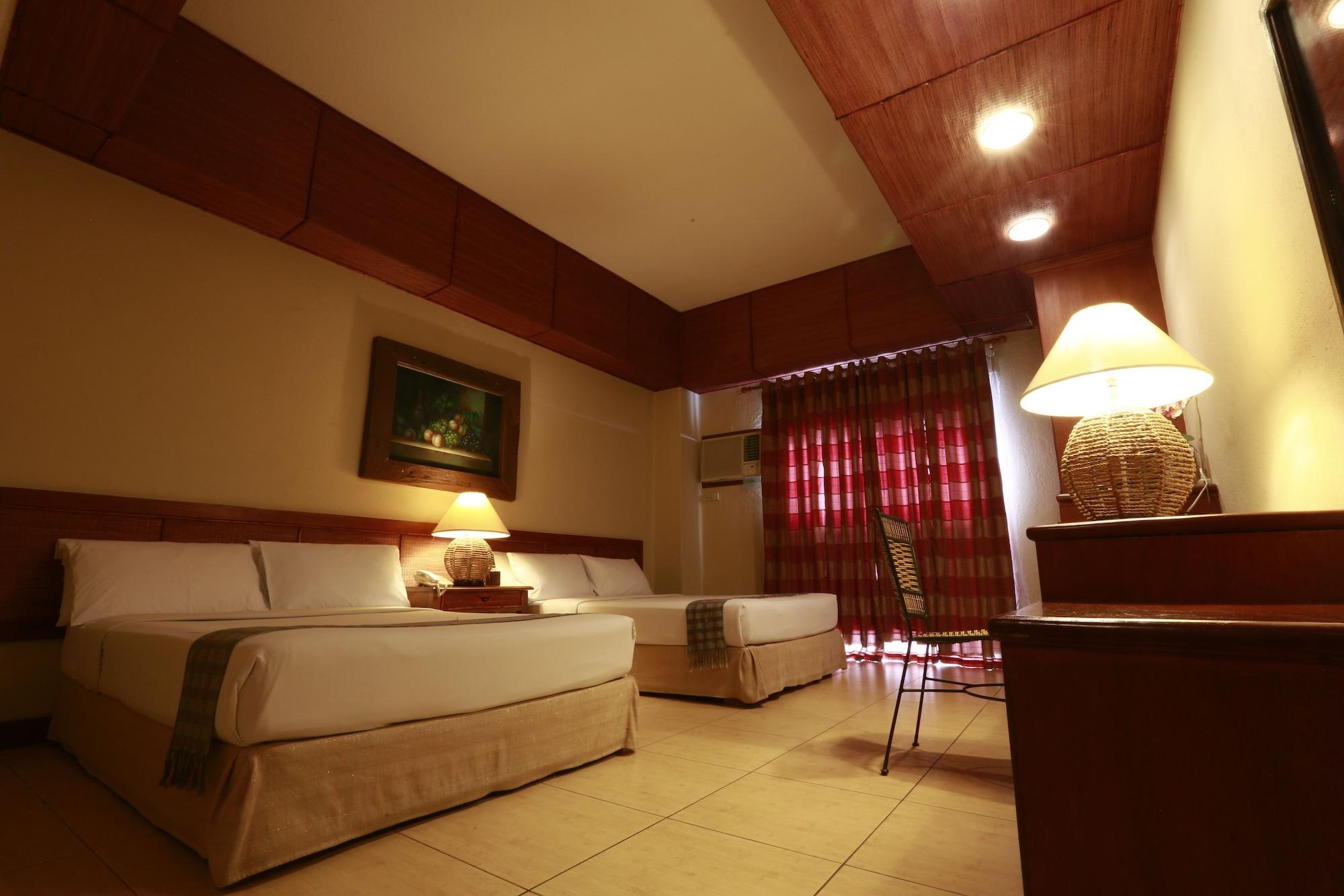 Java Hotel Laoag Luaran gambar