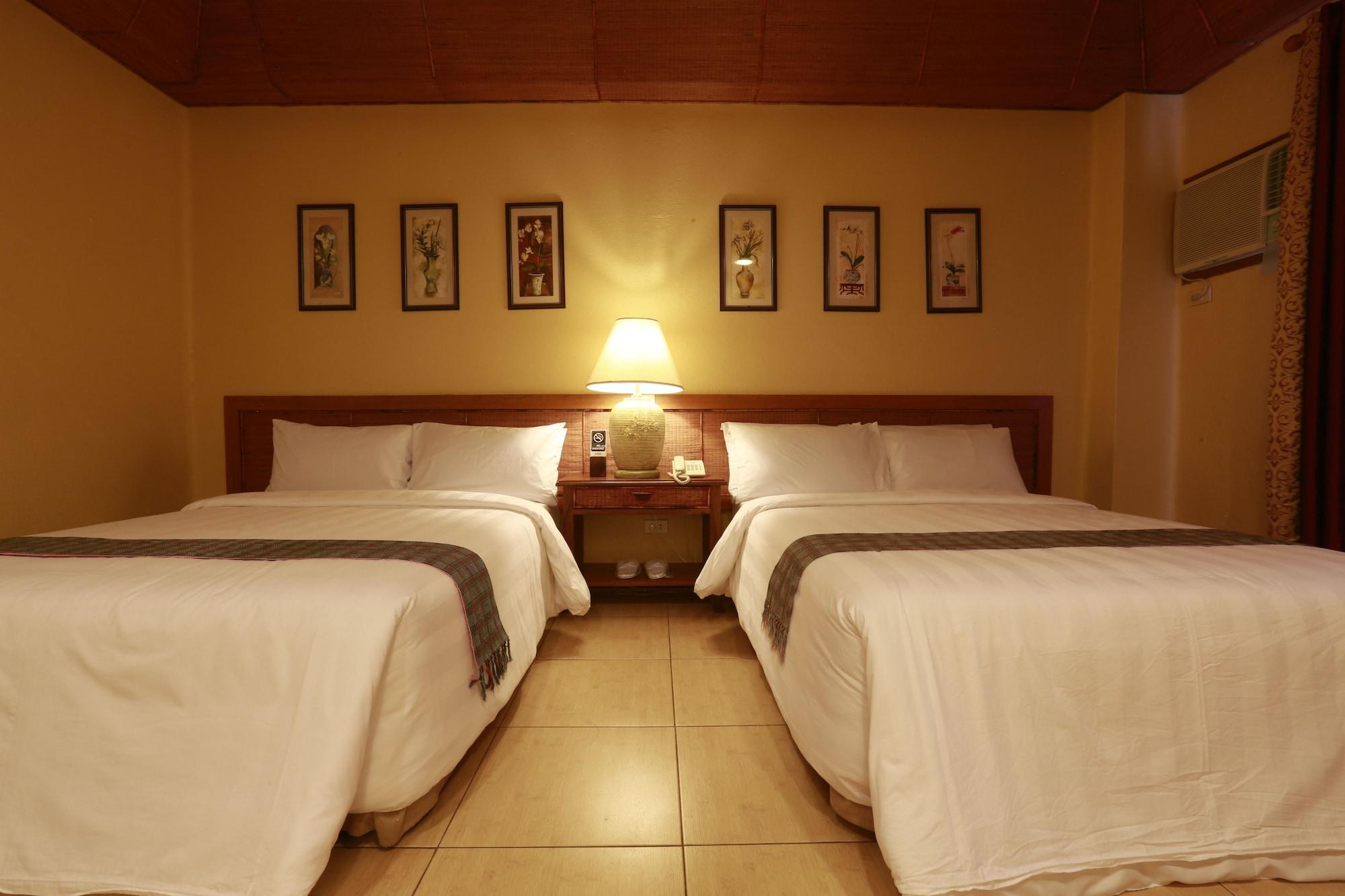 Java Hotel Laoag Luaran gambar