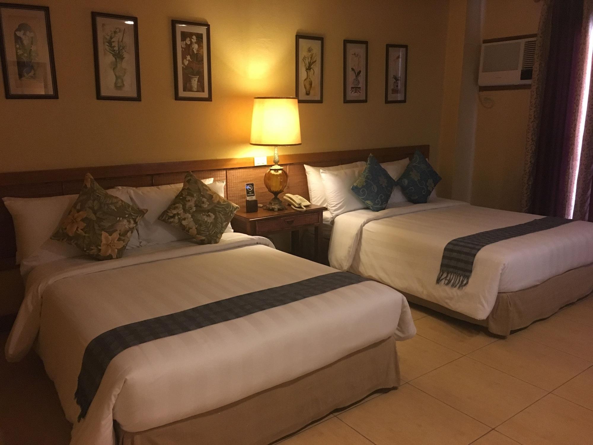Java Hotel Laoag Luaran gambar