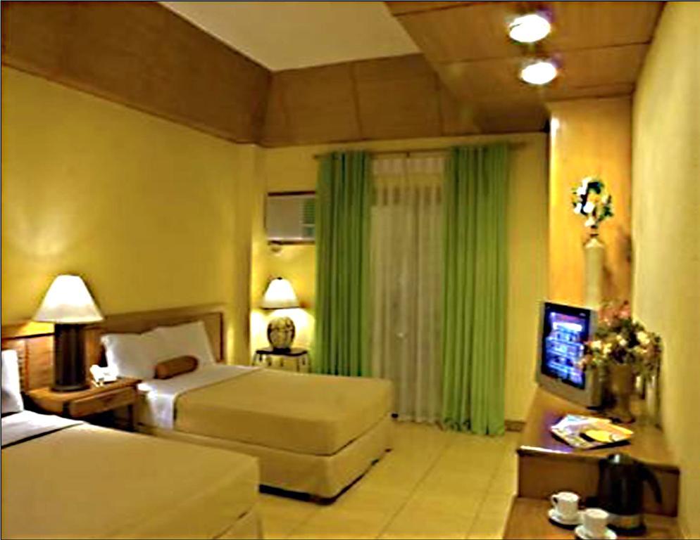 Java Hotel Laoag Luaran gambar