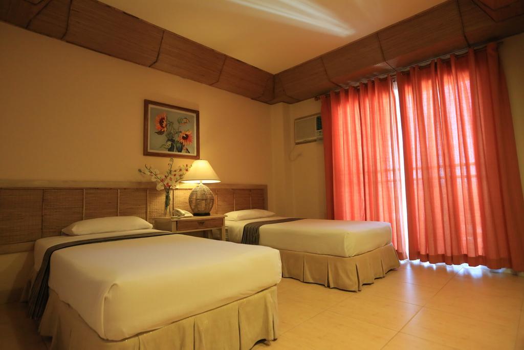 Java Hotel Laoag Luaran gambar