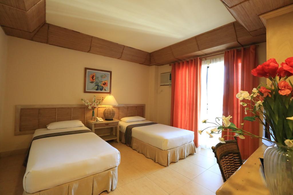 Java Hotel Laoag Luaran gambar