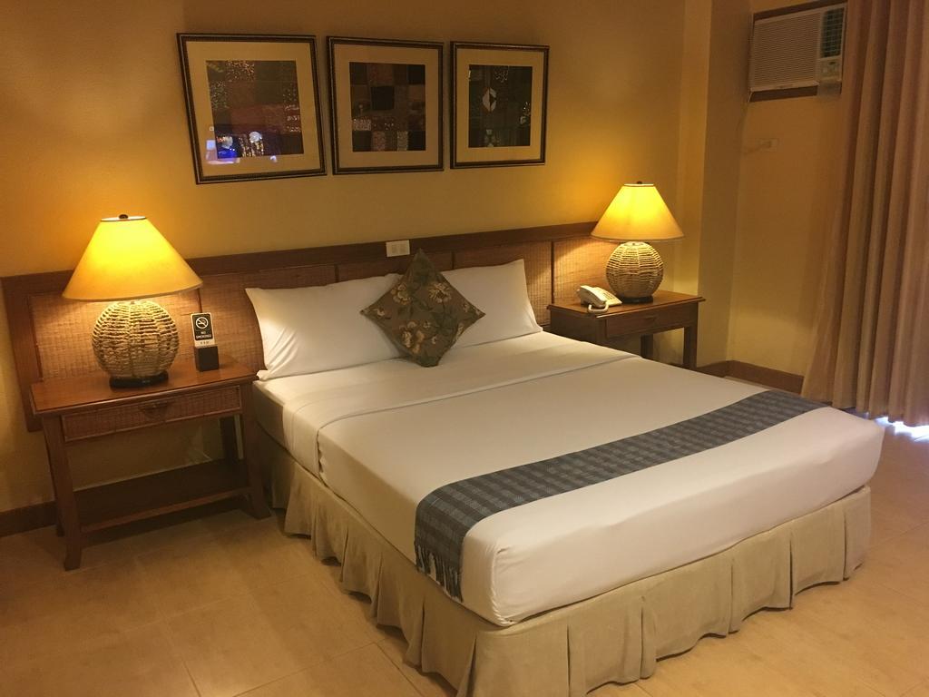 Java Hotel Laoag Luaran gambar