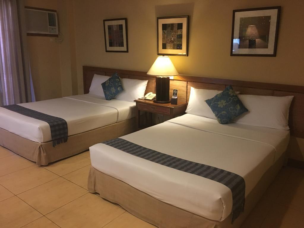 Java Hotel Laoag Luaran gambar